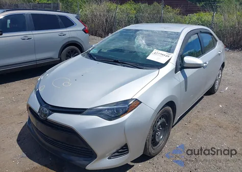 2018 Toyota Corolla Le from USA, damaged, VIN 2T1BURHE3JC989565